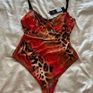 Leopard Print Bodysuit with Red and Black Accents